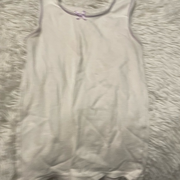 6 white camisoles. Good condition some wear. Size 10-12. - Picture 2 of 2